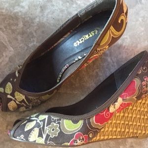 Mildly worn fabric peep toe wedge